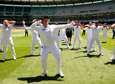 England's Graeme Swann leads the celebrations after the fourth test at the MCG.