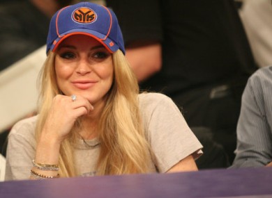 Lohan attends a basketball game in LA on 9 January, 2011.