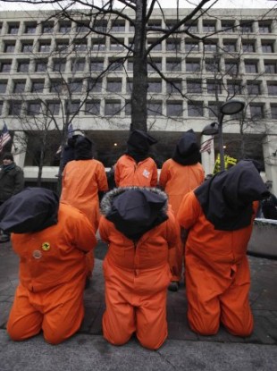 Protestors in faux-Guantanamo detention jumpsuits Washington DC, January 2011.