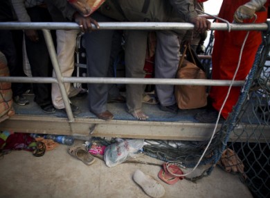 The evacuations continue in Libya. Here, Indian citizens are pictured waiting for a boat leaving Benghazi.
