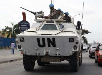 Jordanian UN soldiers driving in Abidjan, Ivory Coast, yesterday.