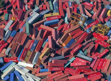 Cargo containers are strewn about in Sendai, northern Japan, after the tsunami that followed yesterday's 8.9-magnitude earthquake.