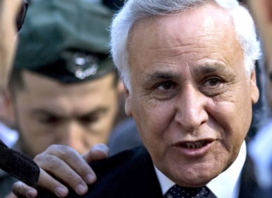 Former Israeli President Moshe Katsav arrives at a court in Tel Aviv, today.