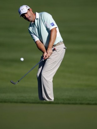 Harrington chips on the 10th hole during the first round of the Transitions Championship, Florida.