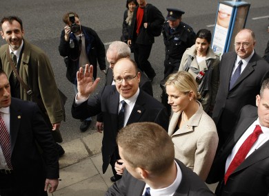 Prince Albert of Monaco II and his fiancee Charlene Wittstock (centre) leave the National Museum of Dublin at the start of a two-day state visit to Ireland.