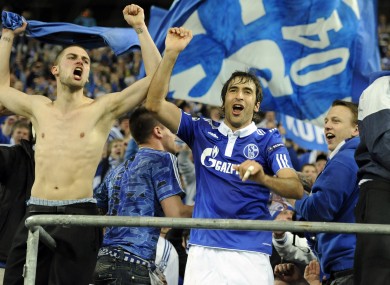 Raul celebrates with Schalke fans following the German side's quarter-final victory against Inter Milan.