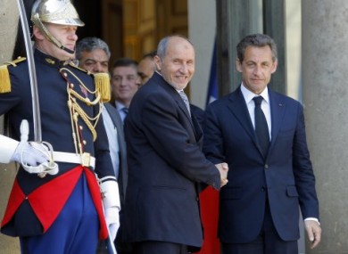 French President Nicolas Sarkozy pictured with the Libyan National Transitional Council's Mustapha Abdeljalil in Paris today.