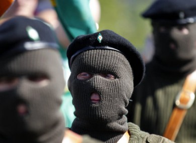 Masked members of the Real IRA at a 1916 Easter Rising commemoration yesterday.