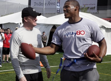 NFL draft prospect Cam Newton, right, and Commissioner Roger Goodell at the pre-draft event in New York yesterday.