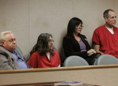 Phillip Garrido (right) and his wife Nancy (second from left), pictured with their attorneys