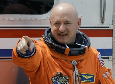 Commander Mark Kelly - the husband of Gabrielle Giffords - poses before last Friday's aborted launch of the Endeavour space shuttle.