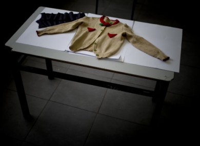 A jumper belonging to an eight year old Holocaust victim named Gitel is displayed on a table after being donated by family members to the Yad Vashem Holocaust Memorial.