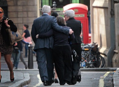 Families of the victims of the 7/7 bombings leave the high court in London today following the inquest verdict.