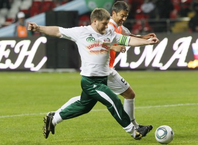 Alessandro Costacurta tries to dispossess Chechen leader Ramzan Kadyrov during last night's game.
