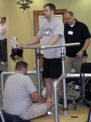 2010 photo provided by Rob Summers showing him receiving physical therapy.