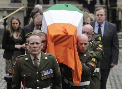 Garret FitzGerald's coffin is taken from Mansion House yesterday evening after thousands had turned out to pay their respects to him.