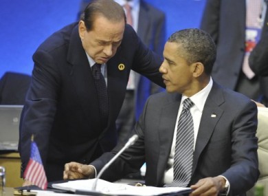 Italian Prime Minister Silvio Berlusconi pictured with US President Barack Obama at the G8 summit yesterday.