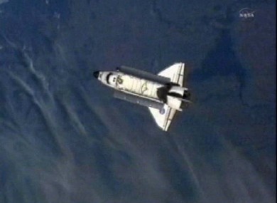 A shot from the International Space Station shows Endeavour heading back towards Earth on its final ever mission.