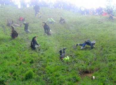 Competitors participating in yesterday's Cheese Rolling.