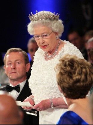 Queen Elizabeth speaks in Dublin Castle this evening, watched by Taoiseach Enda Kenny (left) and President Mary McAleese (right).