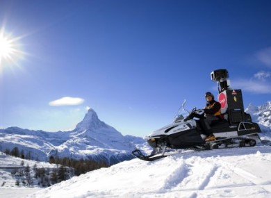 The Google Street View Snow Mobile takes pictures of ski slopes for Google's Street View with the Matterhorn in the background.