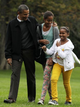 President Obama with his daughters Sasha (far right) and Malia. The girls haven't travelled to Ireland, but Uncle Enda didn't forget them