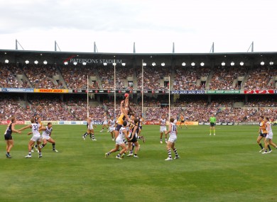 Dean Cox and Nic Natanui of the West Coast Eagles battle for possession in the 33rd Western Derby.