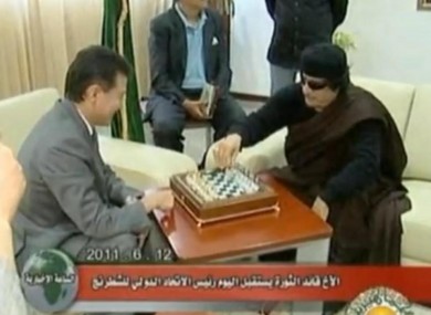Gaddafi and Ilyumzhinov get down to some serious gaming on Sunday.