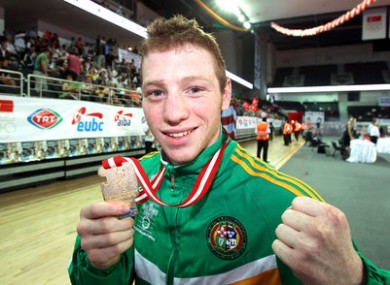 Ireland's Ray Moylette with his gold medal after winning his Men's 64Kg final against Thomas Stalker of England.