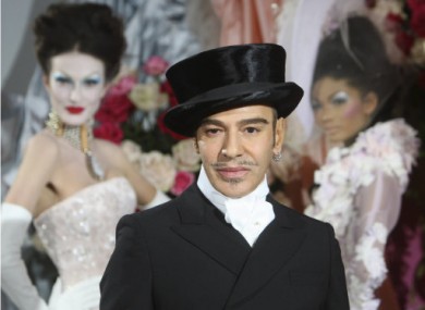 25 January 2010: Galliano poses at the end of the Dior Haute Couture Spring/Summer 2010 collection in Paris.
