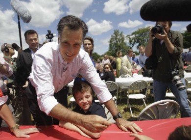 Former Massachusetts Governor Mitt Romney greets supporters before announcing he is running for president today.