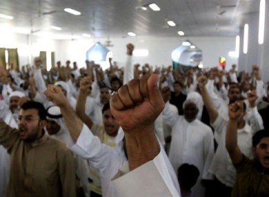 Bahraini Shiite Muslims chant slogans for the release of prisoners on Friday in Diraz.