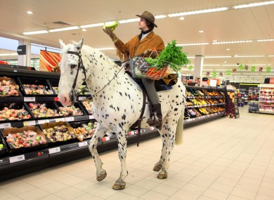 Clean up on aisle two! An English supermarket finds a novel way of celebrating the launch of the DVD of the hit western 'True Grit'