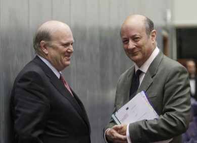 Michael Noonan speaks with his Polish counterpart Jacek Rostowski in Luxembourg today. The summit of EU finance ministers agreed to remove a 'preferred creditor' clause from the EU's new bailout mechanism.