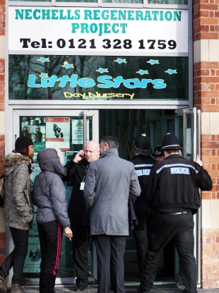 Police officers entering Little Stars Nursery in Birmingham in January
