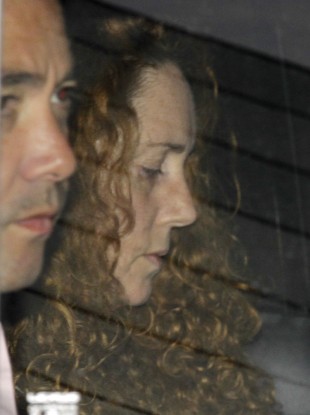 Rebekah Brooks leaves News International's premises in Wapping yesterday after telling NotW staff the paper was being closed.