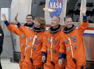 Mission specialists Rex Walheim, Sandy Magnus, pilot Doug Hurley and commander Chris Ferguson on their way to the space shuttle Atlantis