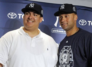 Jeter and Lopez happy before the taxman cometh.