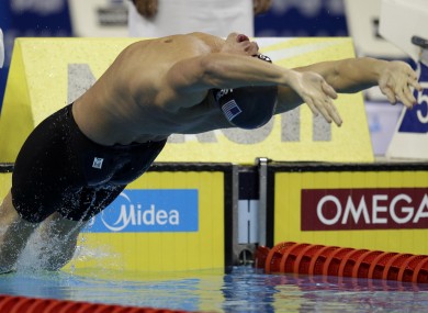 Lochte achieves lift-off at the start of the 200m backstroke.