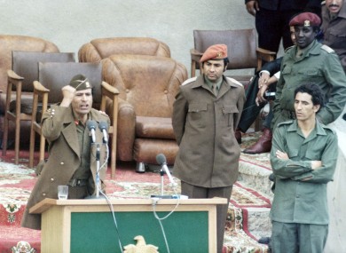 Then-prime minister Abdessalam Jalloud, pictured far right, watches Muammar Gaddafi (left) give a speech in 1977. Jalloud has now joined the side of the Libyan rebels trying to oust Gaddafi.