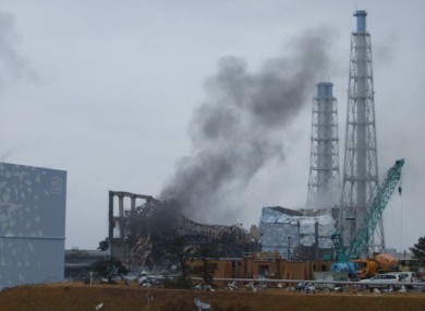 Smoke rises from Fukushima reactor 3 in this March 21 photo