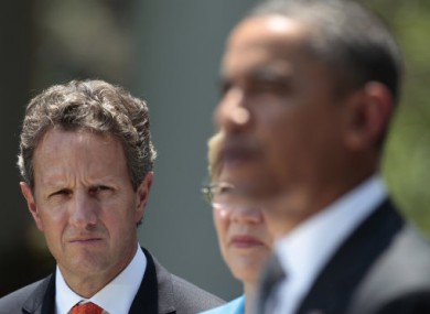 Treasury Secretary Timothy Geithner listening to Barack Obama speak on 18 July, 2011.