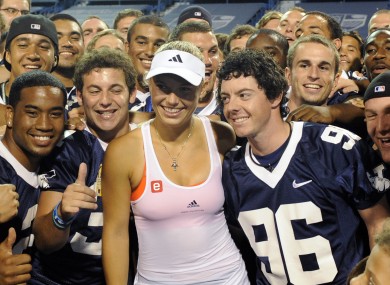 Wozniacki, McIlroy and the Yale football team celebrate her recent victory.