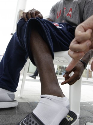 US sprinter Justin Gatlin points to a frostbite scar on his leg during a recent interview