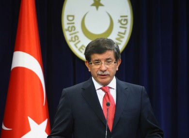 Turkey's foreign minister Ahmet Davutoglu speaks to the press after announcing the expulsion of Israel's ambassador on Friday.