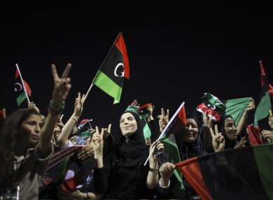 Women celebrate the Libyan revolution and call for more rights in the capital of Tripoli on Friday.