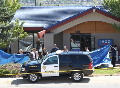 Officials investigate the scene of a shooting in an IHOP restaurant in Carson City, Nevada yesterday.