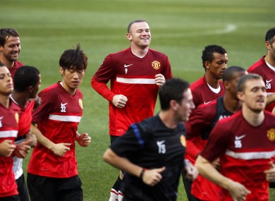 Rooney and teammates at Benfica's Luz stadium in Lisbon last night.