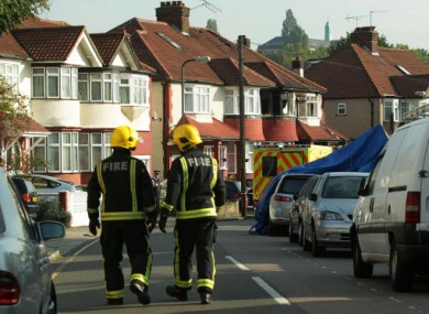 Firefighters at the scene of the fatal fire at Sonia Gardens, Neasden, London.