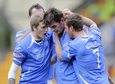 Cavan man Cillian Sheridan celebrates with his team-mates after scoring the opener against Hearts yesterday.